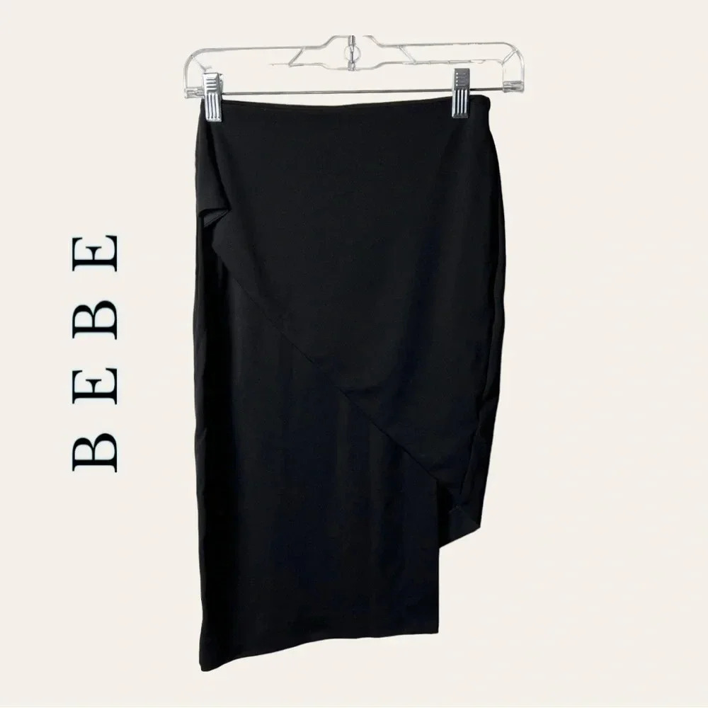 0224. BEBE ASYMMETRICAL WRAPPED MINI SKIRT BLACK IN COLOR SIZE‎ 2